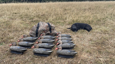 Simon camo mesh decoy bag with shoulder straps, designed for easy carrying and storage of hunting decoys.