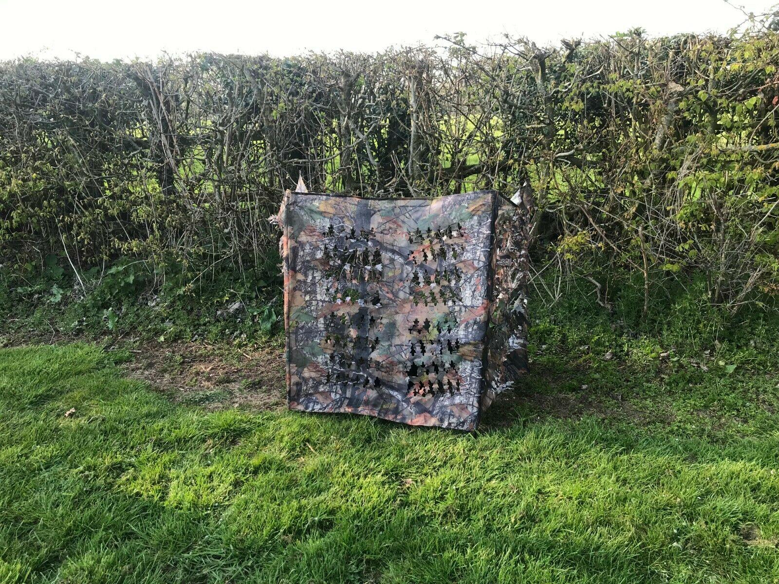 Camo small laydown hide for children or dogs by Simon, showing a compact camouflage-colored pet and child shelter.