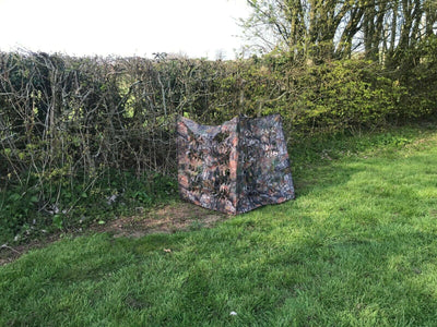 Camo small laydown hide for children or dogs by Simon, showing a compact camouflage hide with open front for pets or kids.