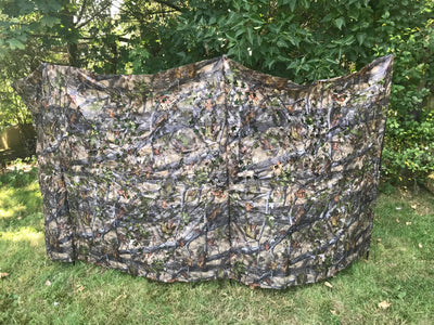 Telescopic pigeon hide in forest camouflage by SIMON, featuring a collapsible design for birdwatching and hunting.