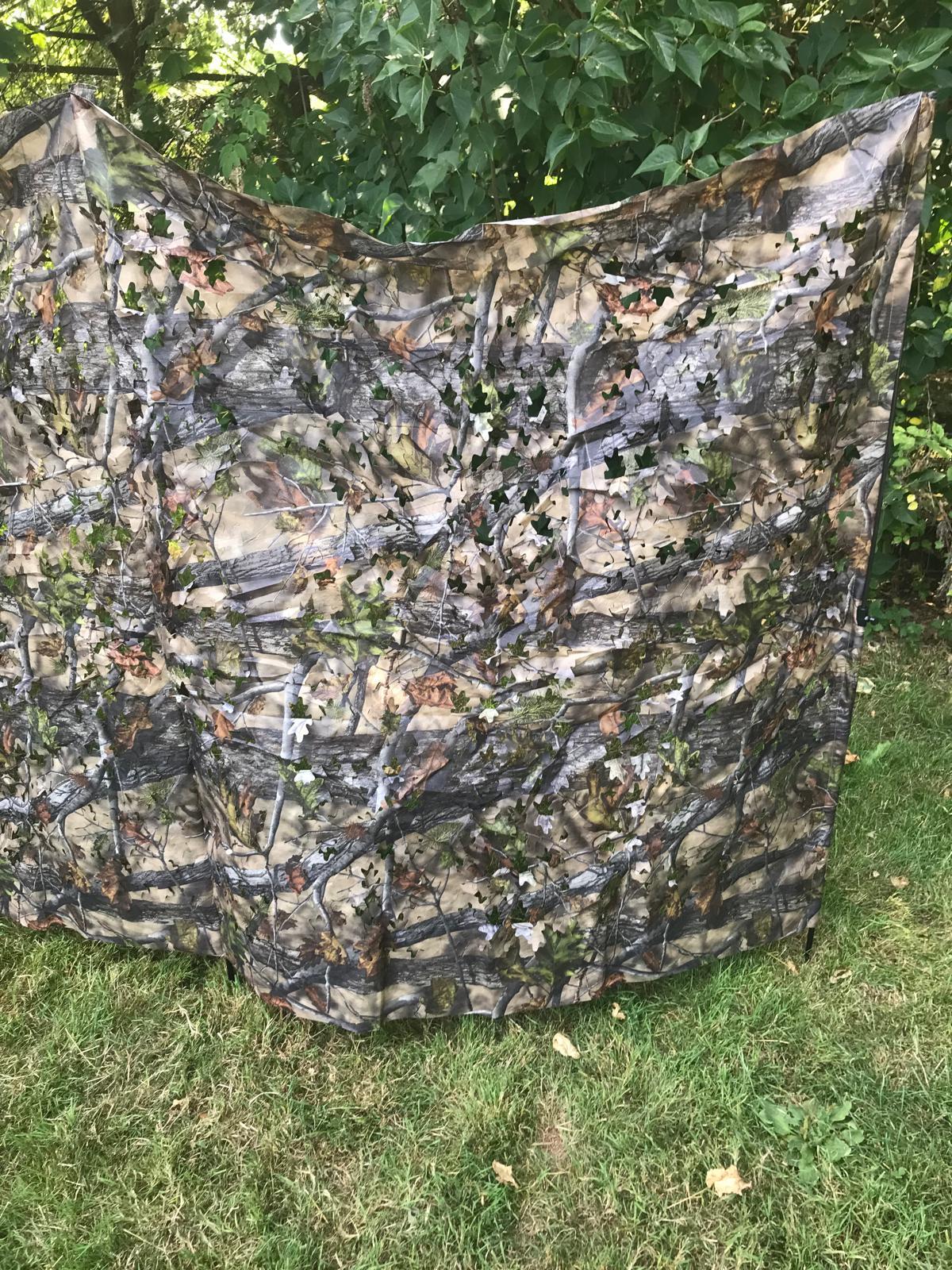 Telescopic pigeon hide in forest camouflage by SIMON, compact and portable for birdwatching and hunting in wooded areas.