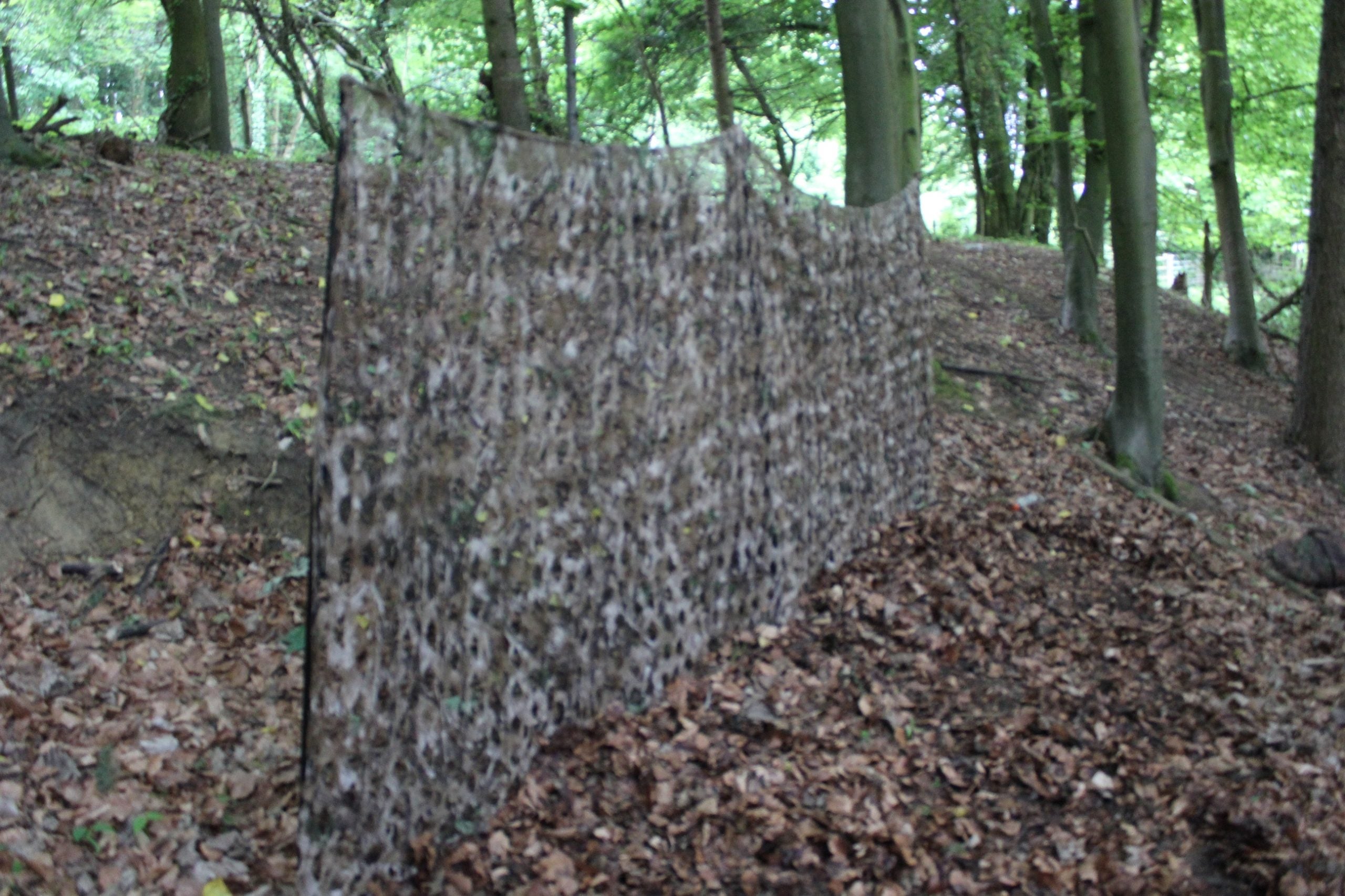Winter Stealth Camo Netting by Simon, 5m x 1.5m, shows close-up of camouflage pattern and netting material for hunting or concealment.
