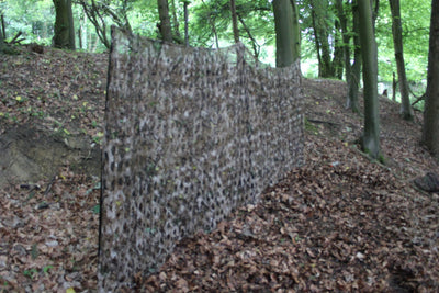 Winter Stealth Camo Netting by Simon, 5m x 1.5m, shows close-up of camouflage pattern and netting material for hunting or concealment.