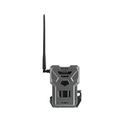 TJACKS accessory for Spypoint FLEX DARK digital trail camera, showing mounting strap and camera lens in outdoor setting.