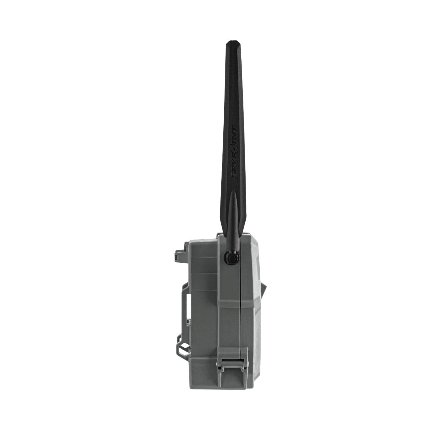 Spypoint FLEX DARK digital trail camera accessory by TJACKS, showing the camera with black casing and outdoor mounting features.