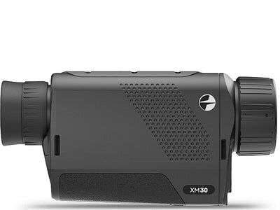 Thermal monocular Pulsar Axion Key XM30 by TJACKS showing handheld device with thermal imaging lens and display screen.