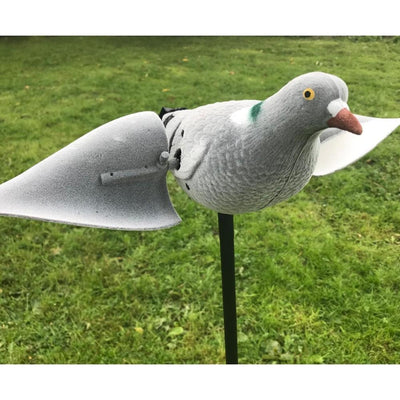 Remote-controlled WINDY motorized spinning wing pigeon decoy for bird hunting or pest control, designed to mimic real pigeons.