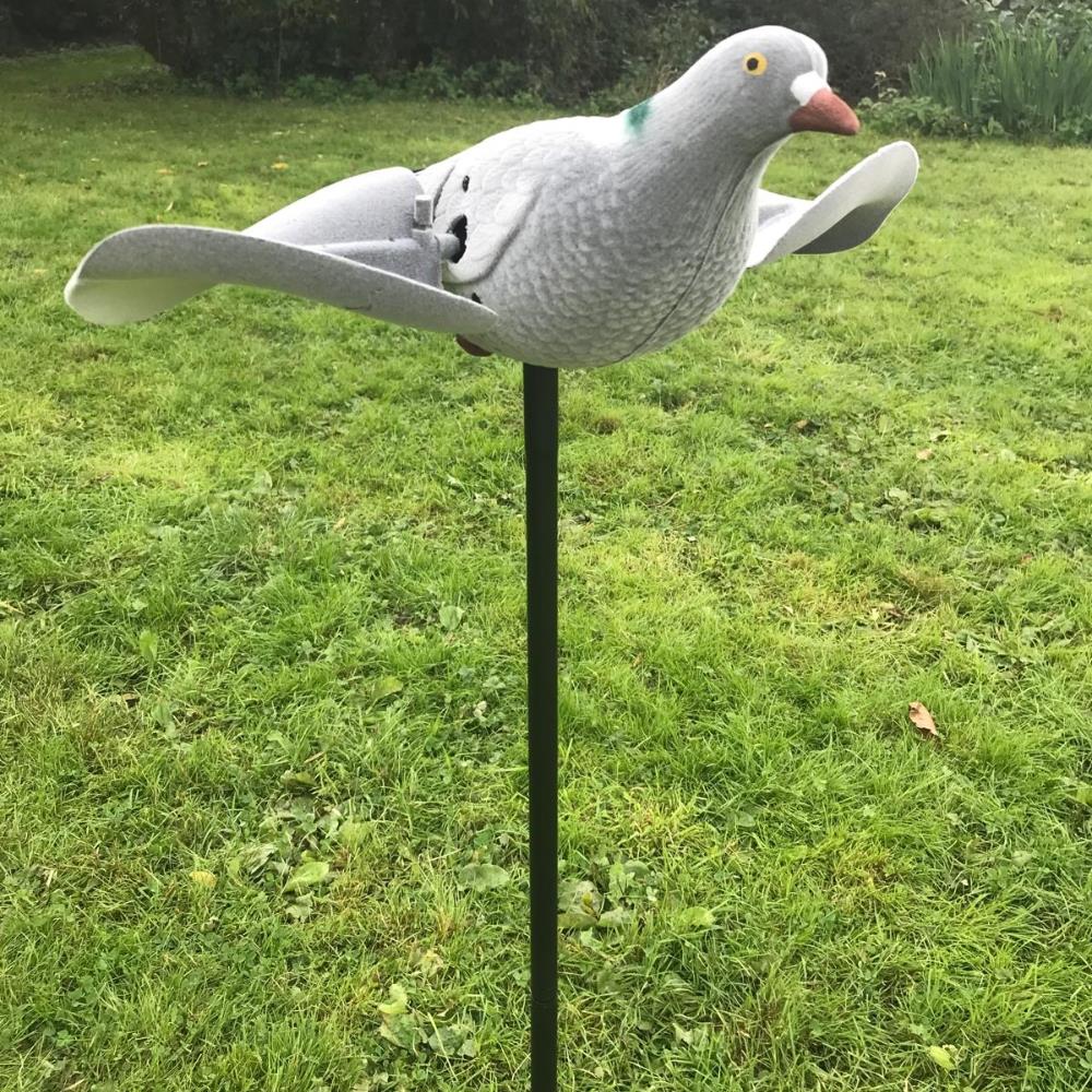 Remote-controlled WINDY motorized spinning wing pigeon decoy for bird deterrence and hunting practice.