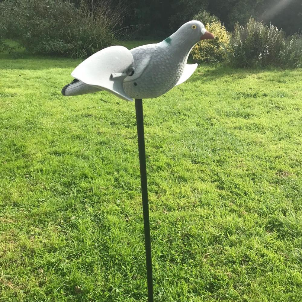 Windy motorized spinning wing pigeon decoy, remote-controlled bird decoy with realistic flying motion for hunting or bird deterrence.